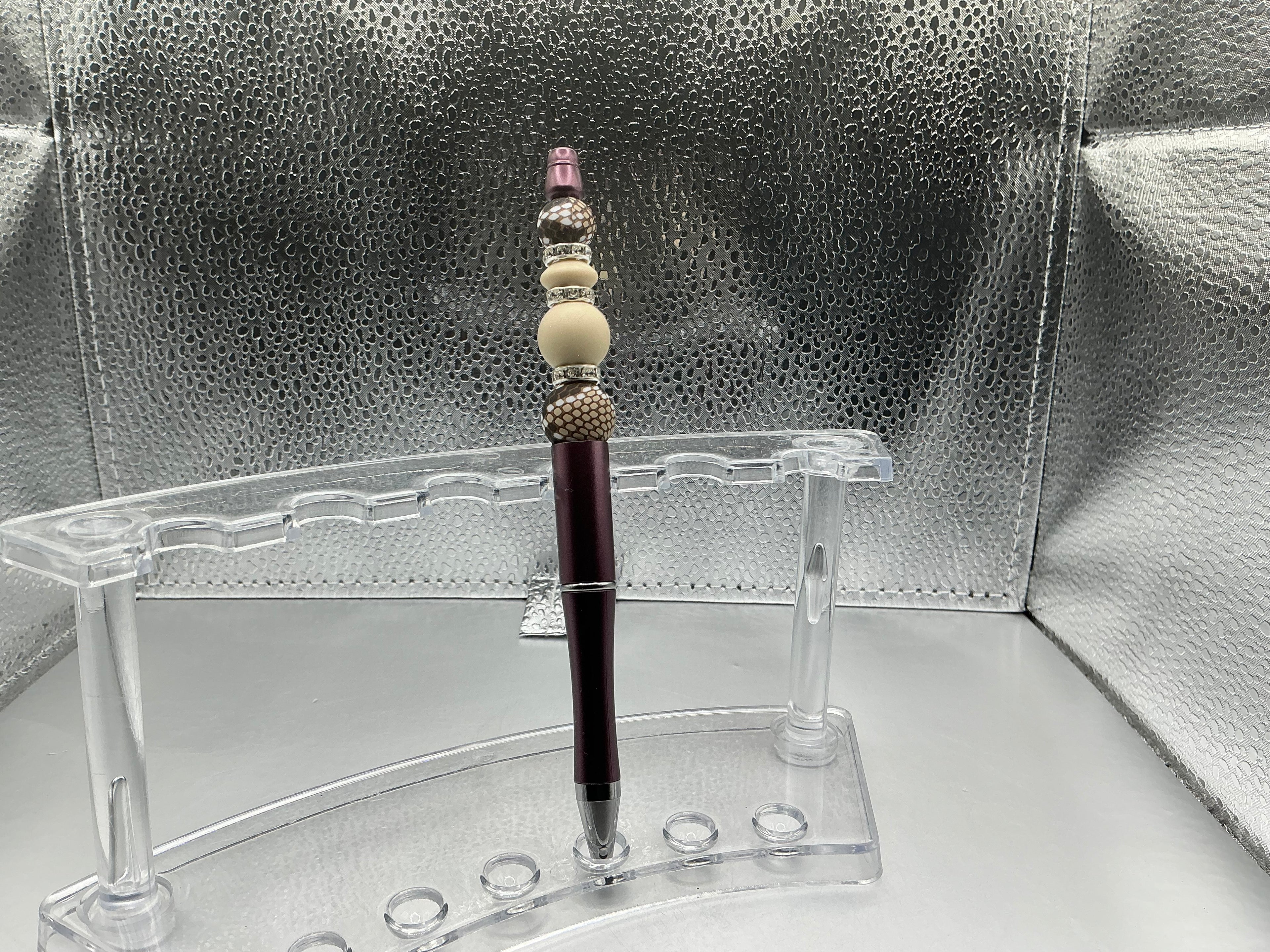 Snake print and tan balls pen (black ink)