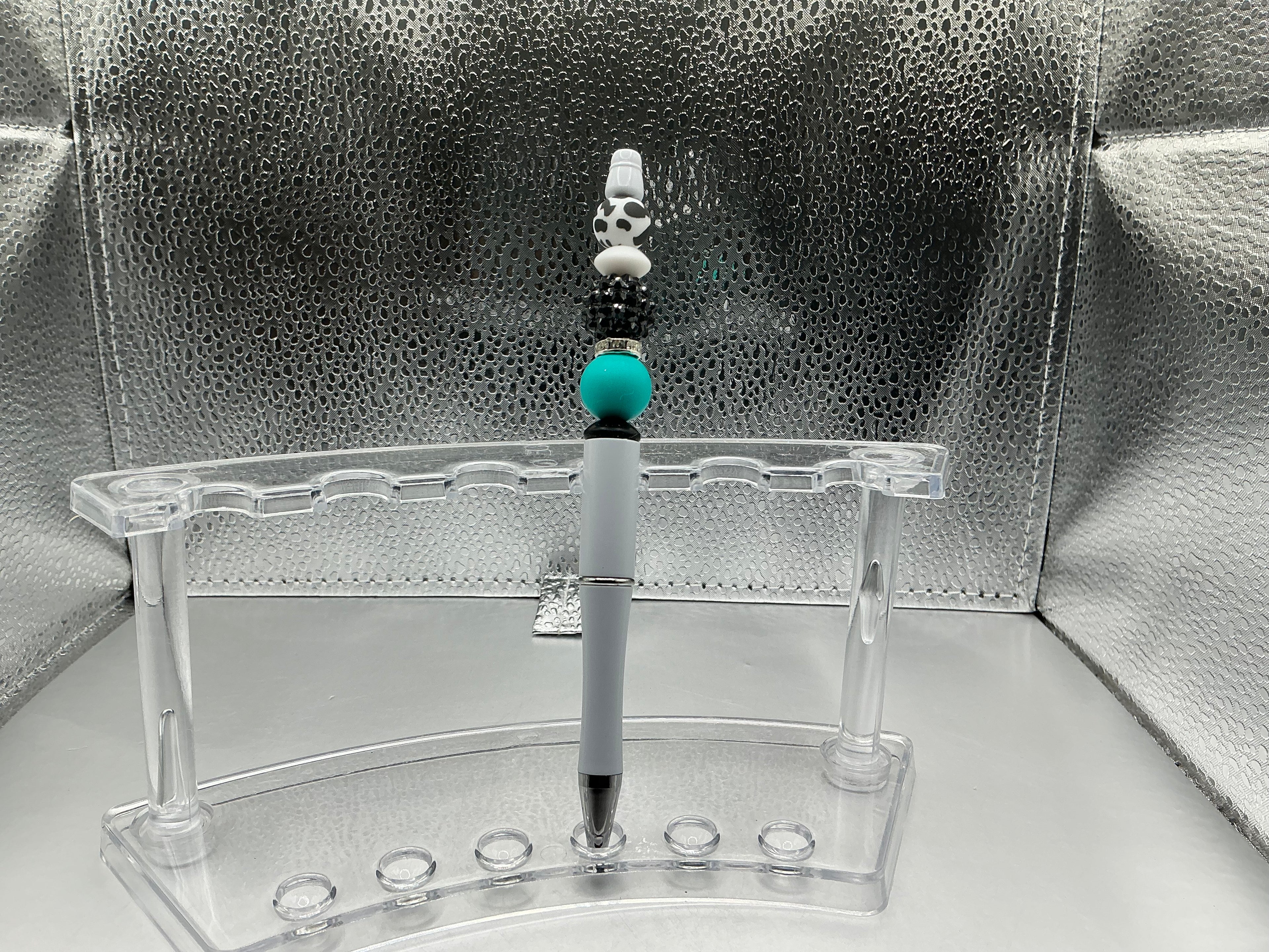 Cow print and teal balls pen (black ink)