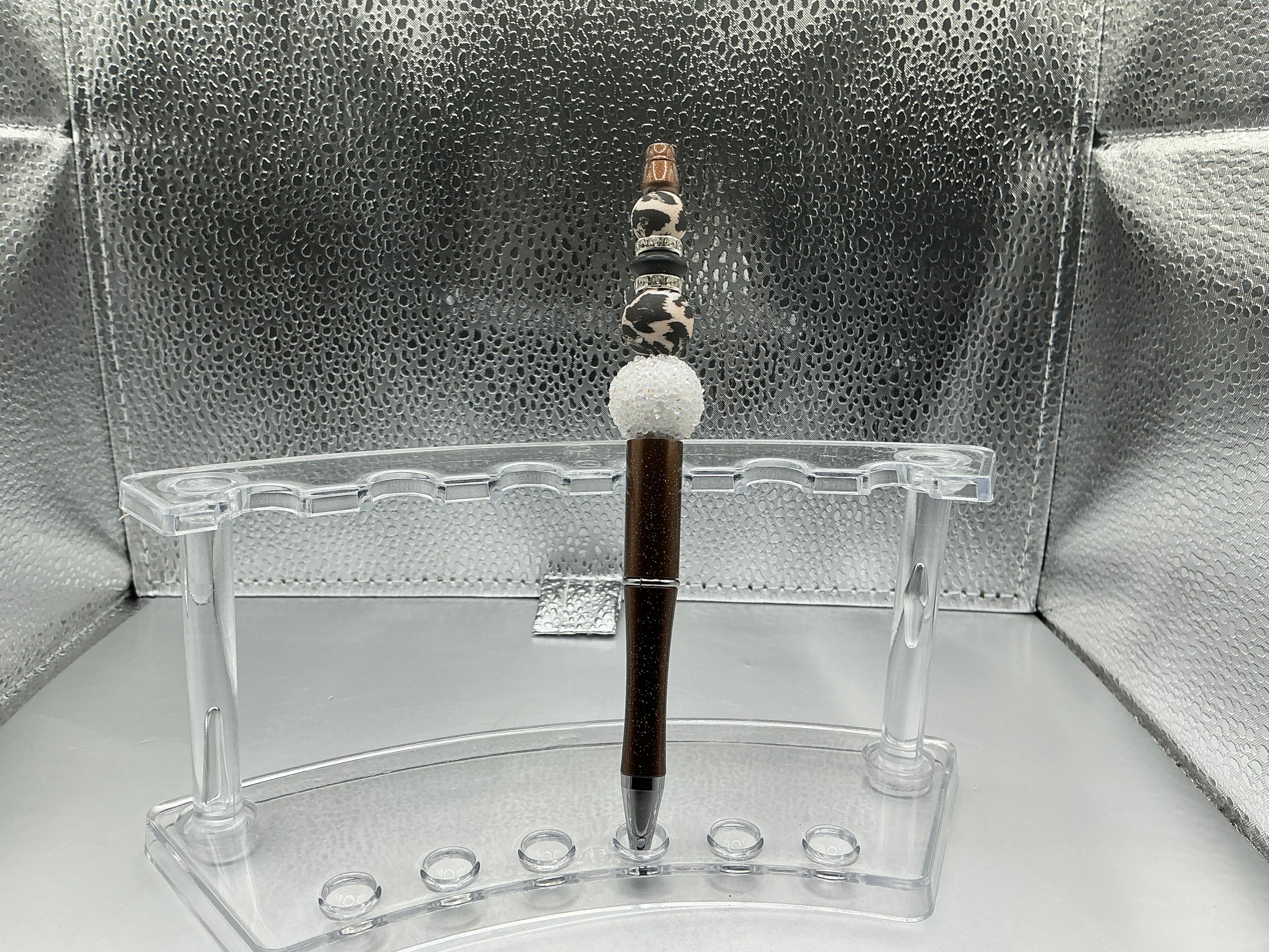 Brown cow print and white balls pen (black ink)
