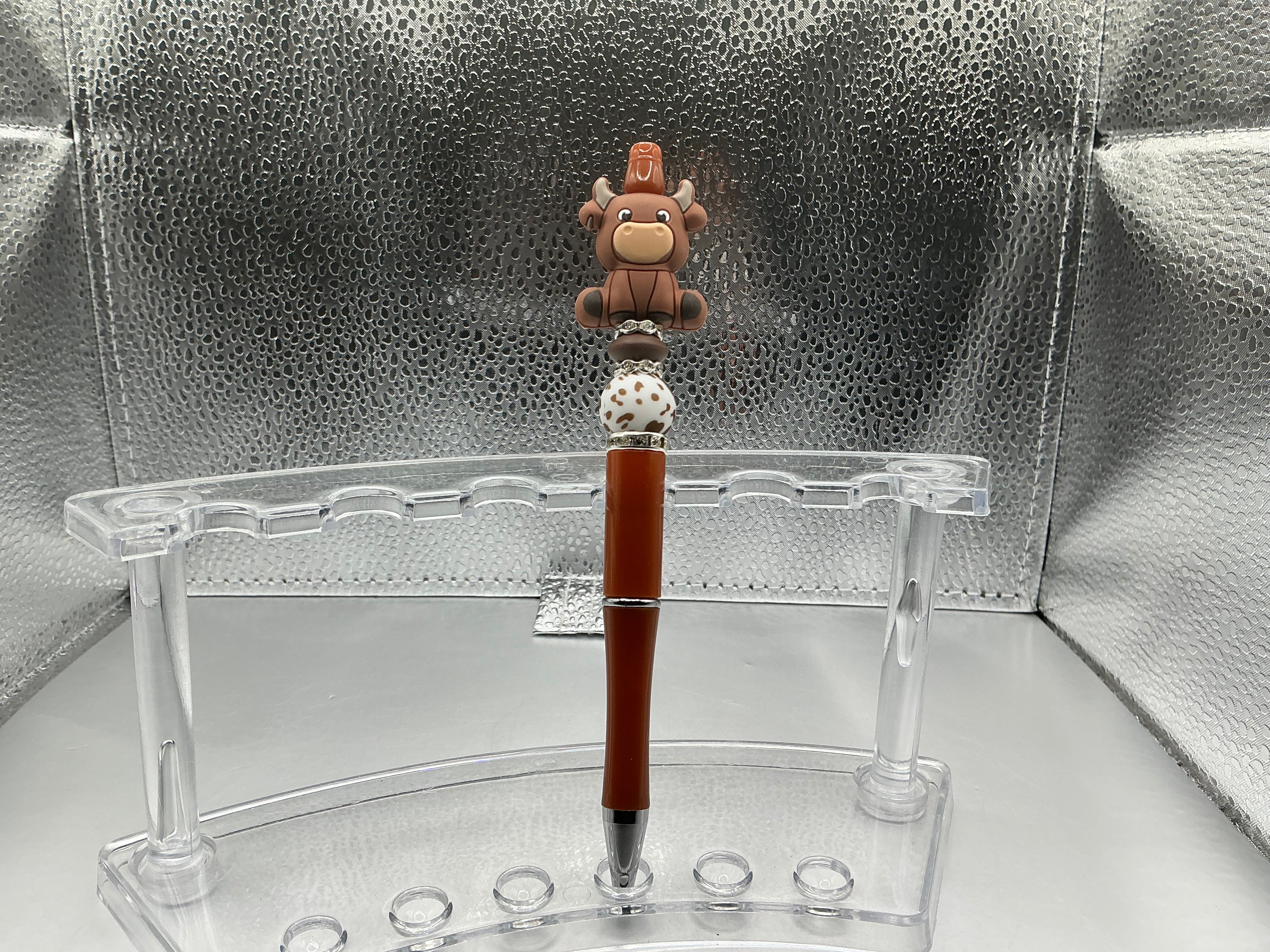 Brown cow pen (black ink)