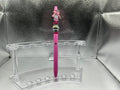 Dr.Pepper with a pink bow pen (black ink)