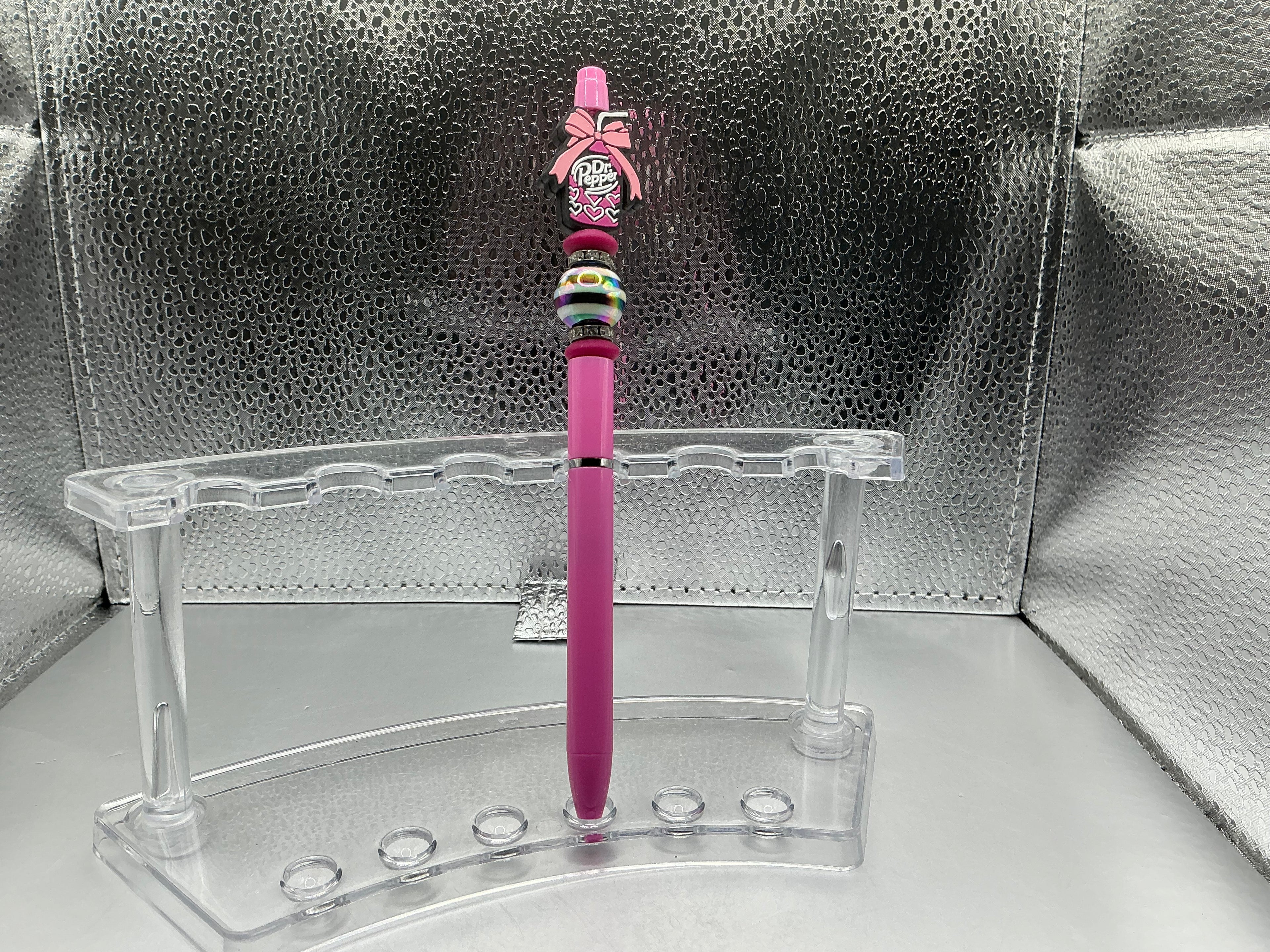 Dr.Pepper with a pink bow pen (black ink)