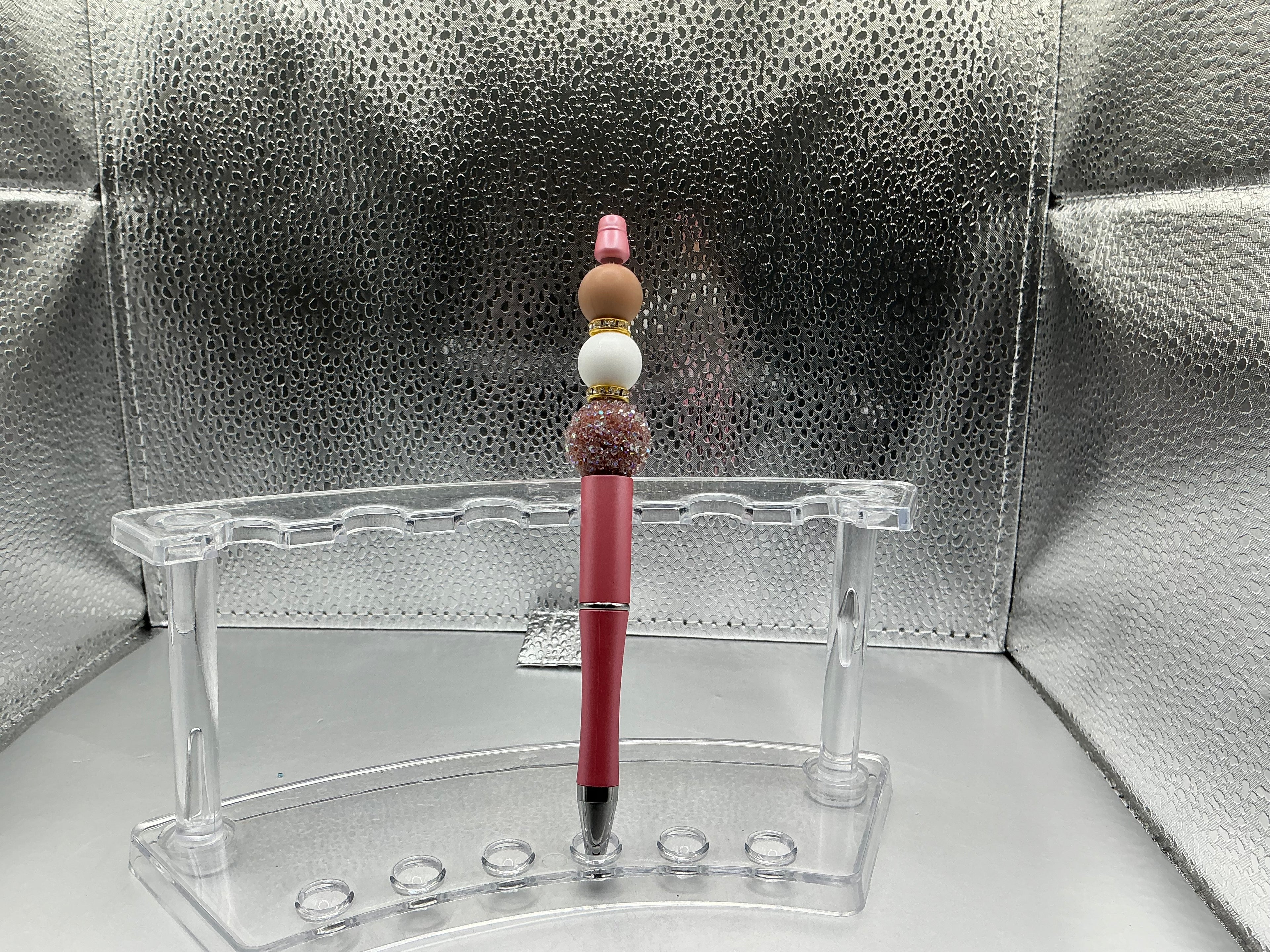 Brown balls pen (black ink)