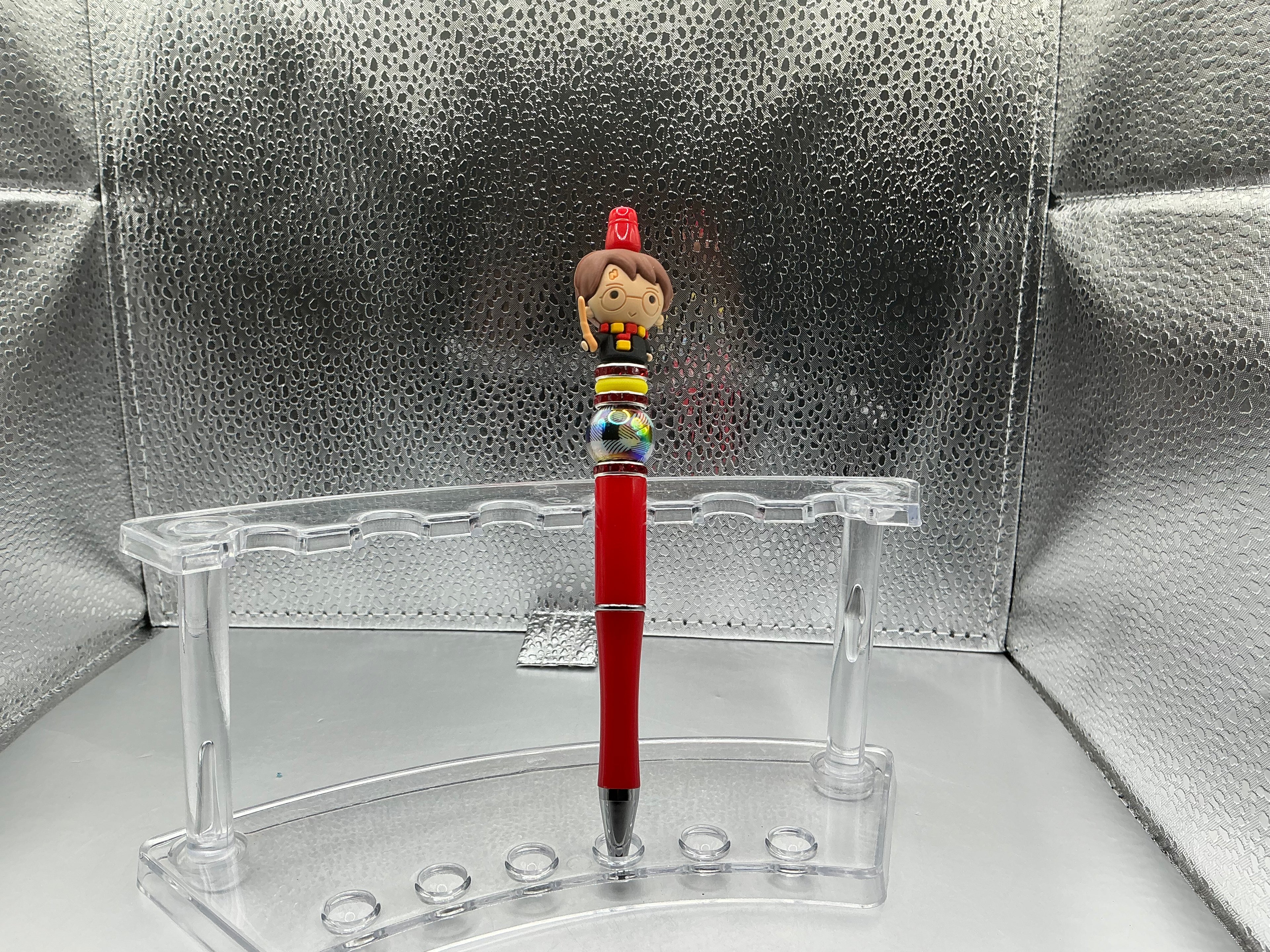 Harry Potter red pen (black ink)