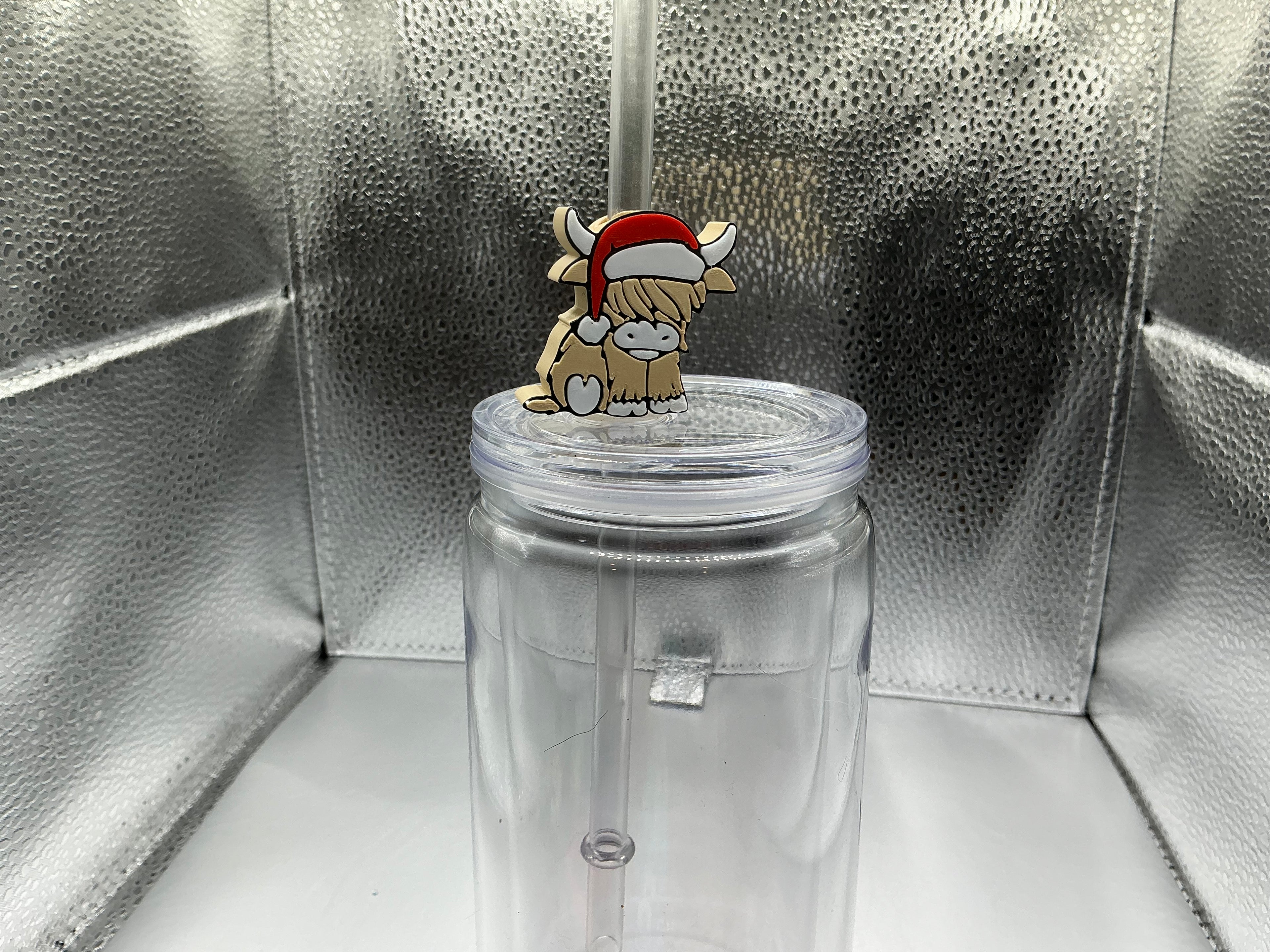 Highland cow with santa hat straw topper