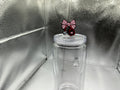 Nurse with a pink bow straw topper