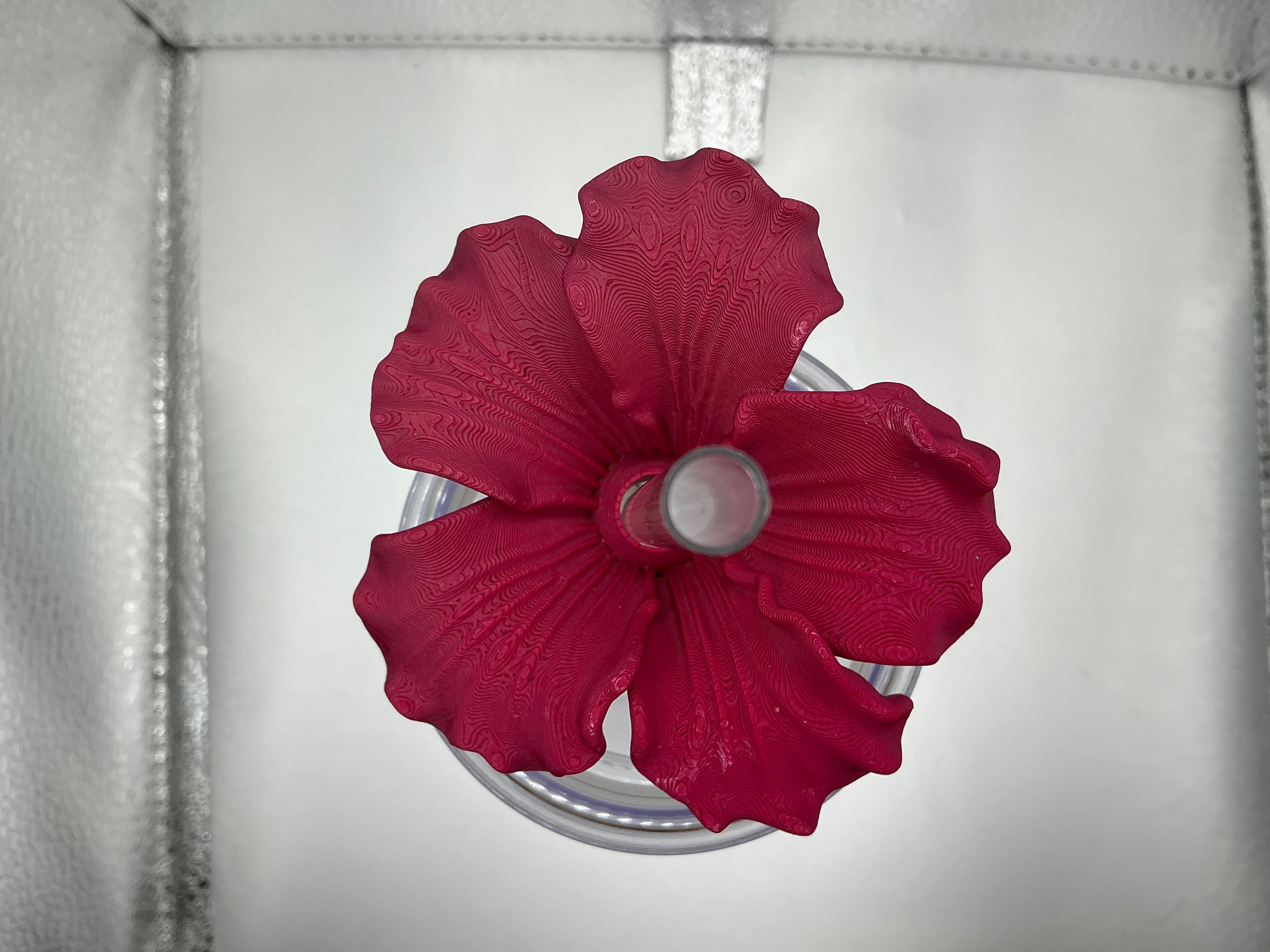 Maroon hibiscus lid topper