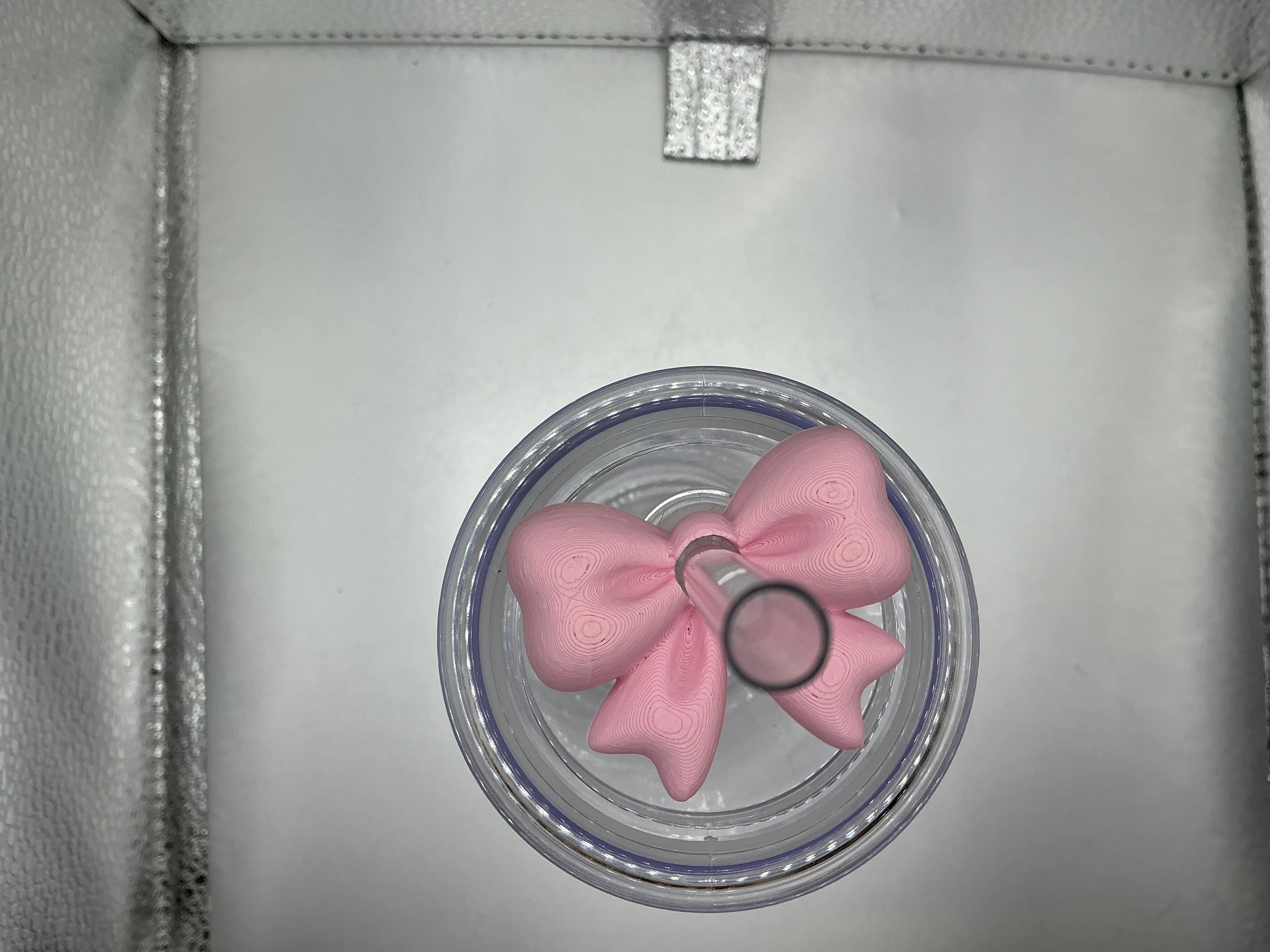 Light pink bow lip topper