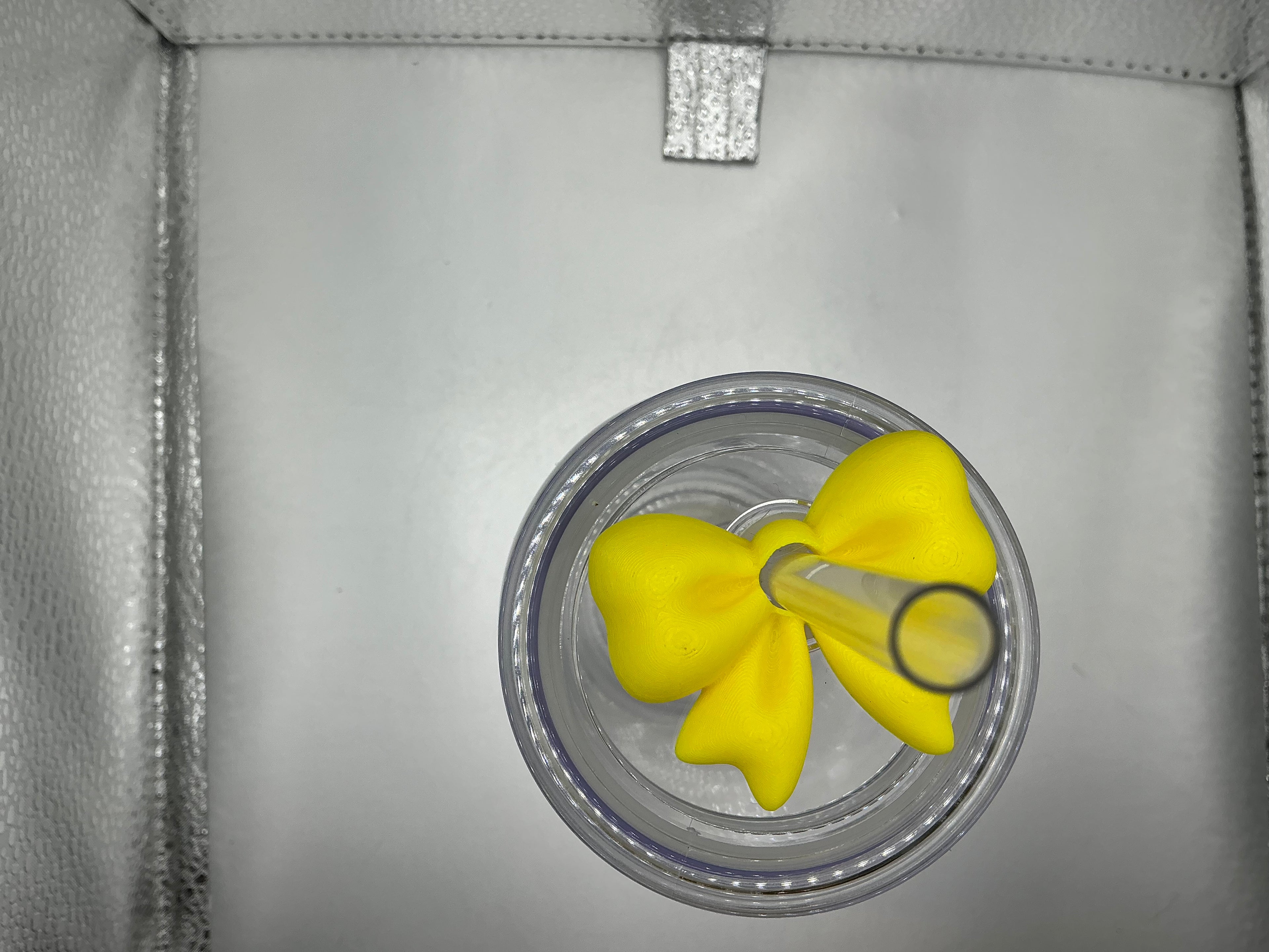 Yellow bow lid topper