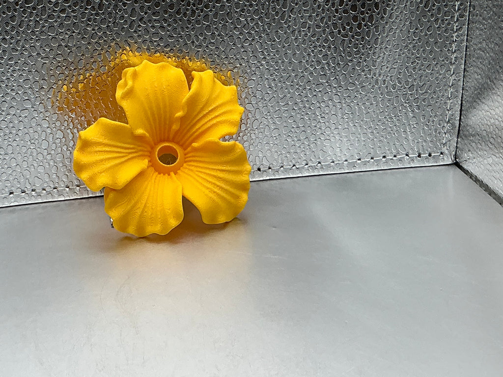 Yellow hibiscus lid topper