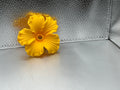 Yellow hibiscus lid topper