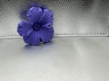 Purple hibiscus lid topper