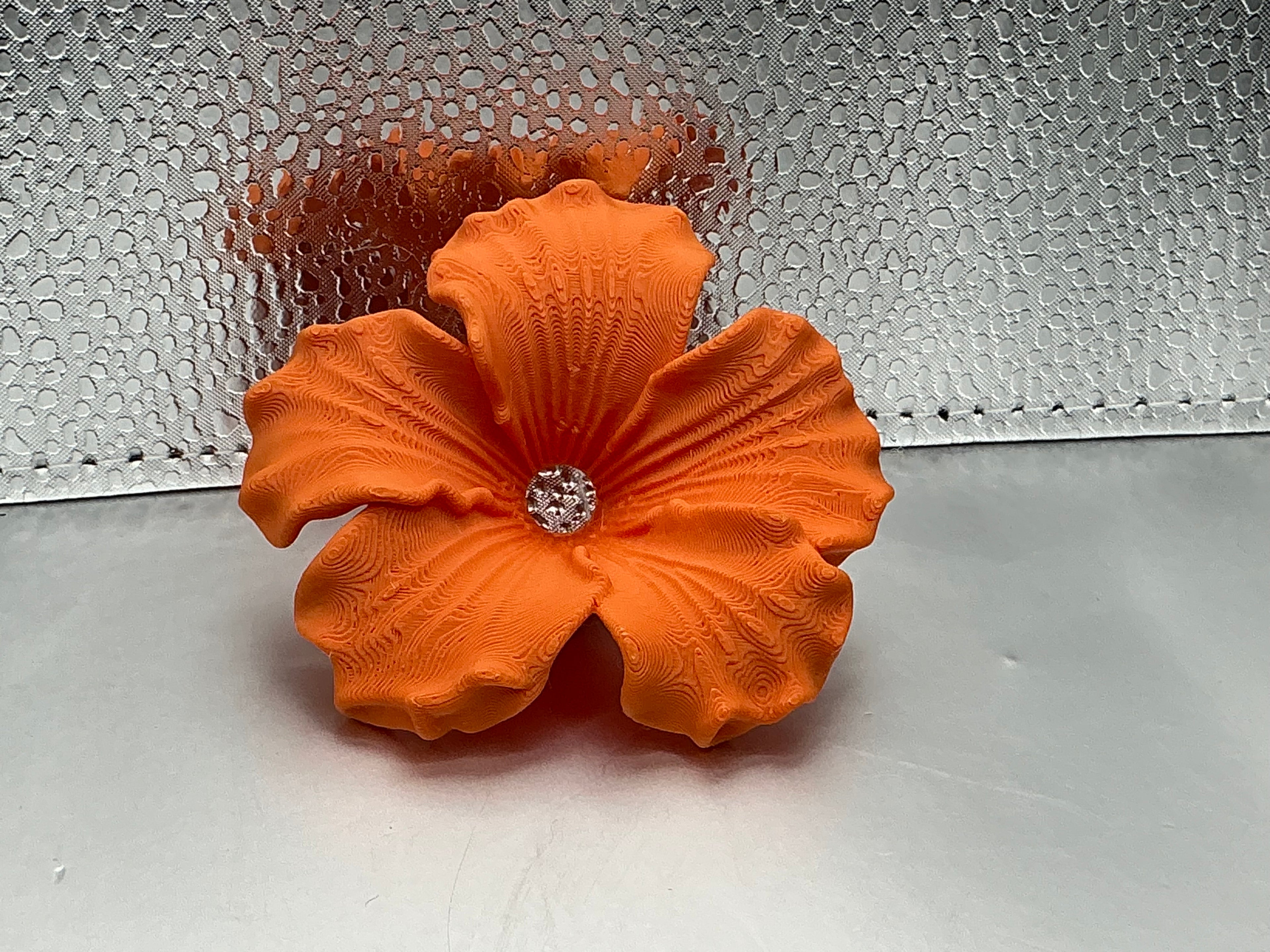 Orange hibiscus lid topper