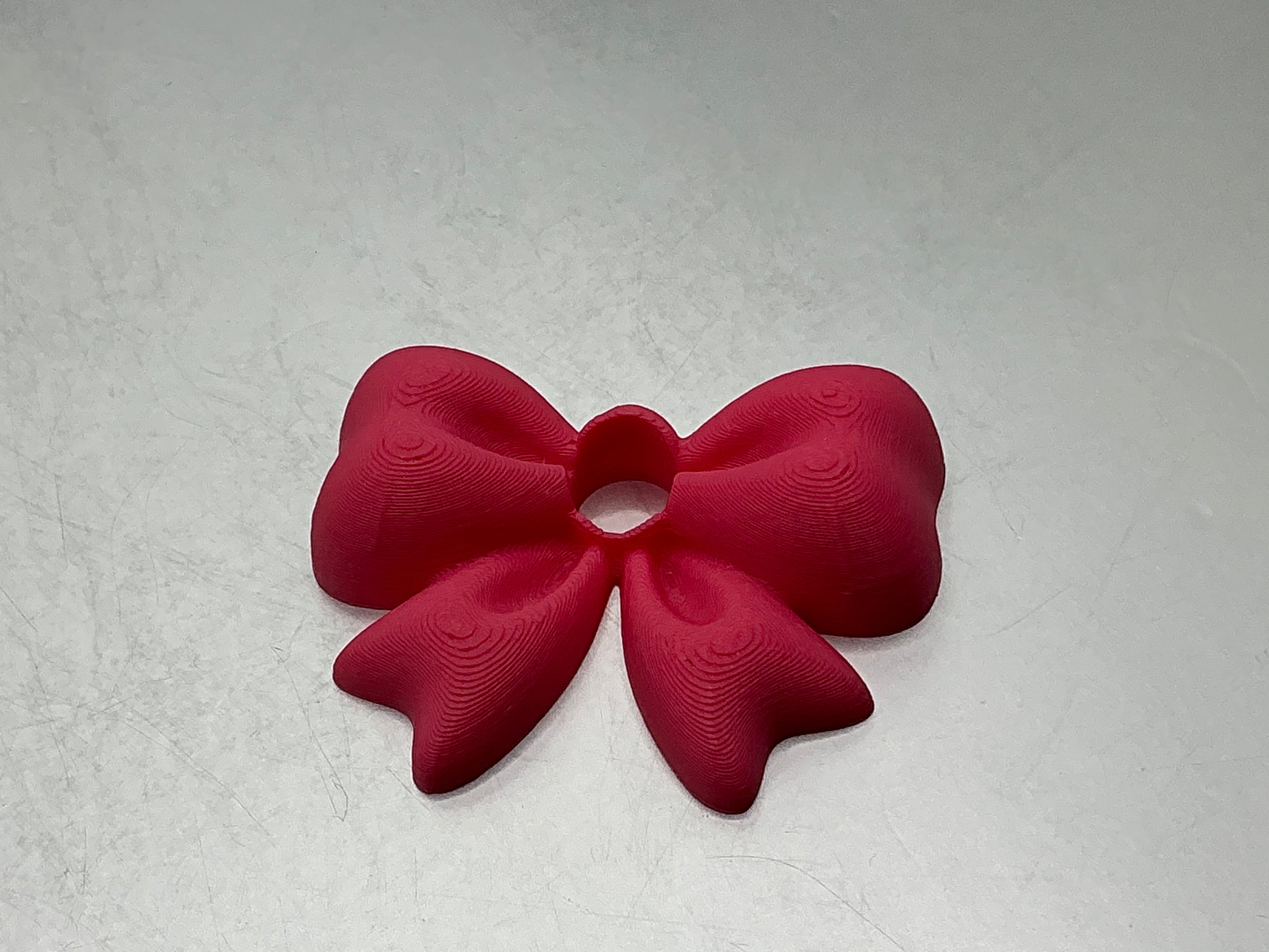 Pink bow lid topper