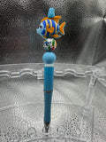 Blue and orange fish pen (black ink)