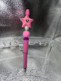 pink starfish pen (black ink)