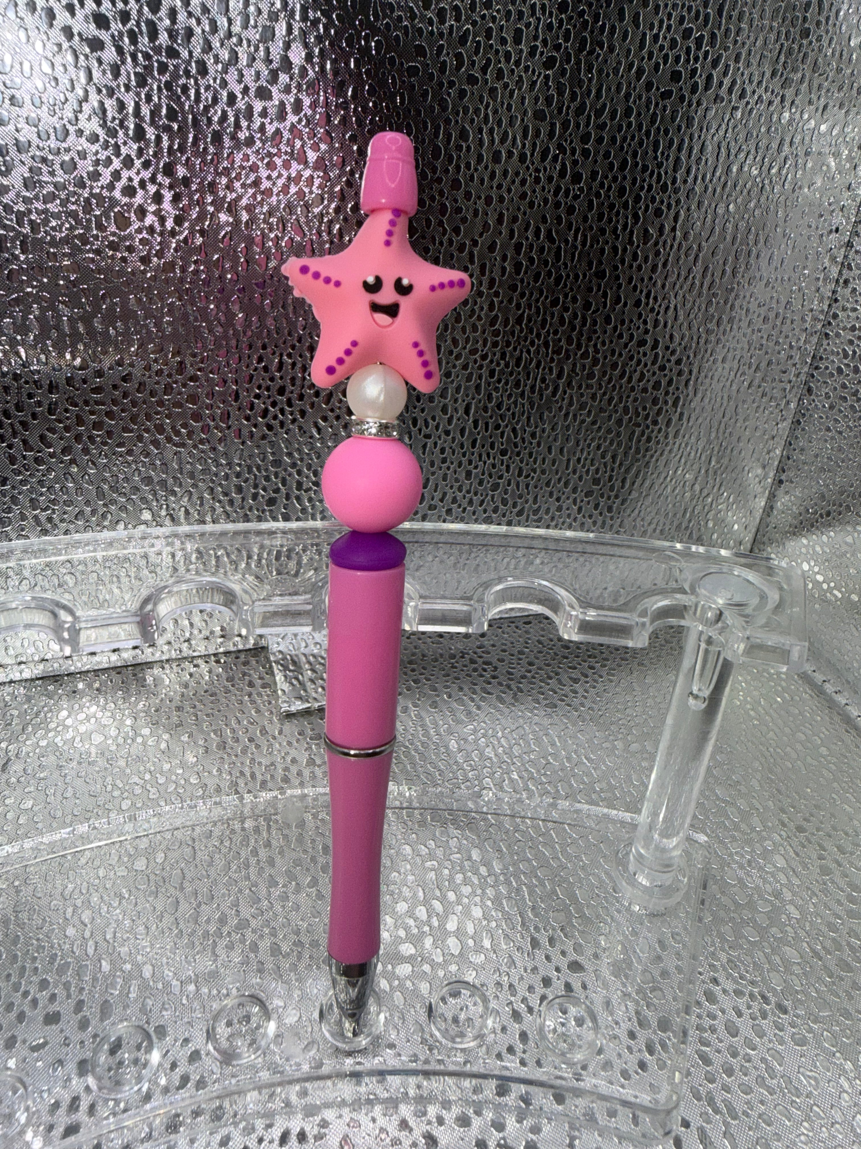 pink starfish pen (black ink)
