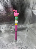 pink flamingo pen (black ink)