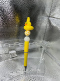 Yellow duck pen (black ink)