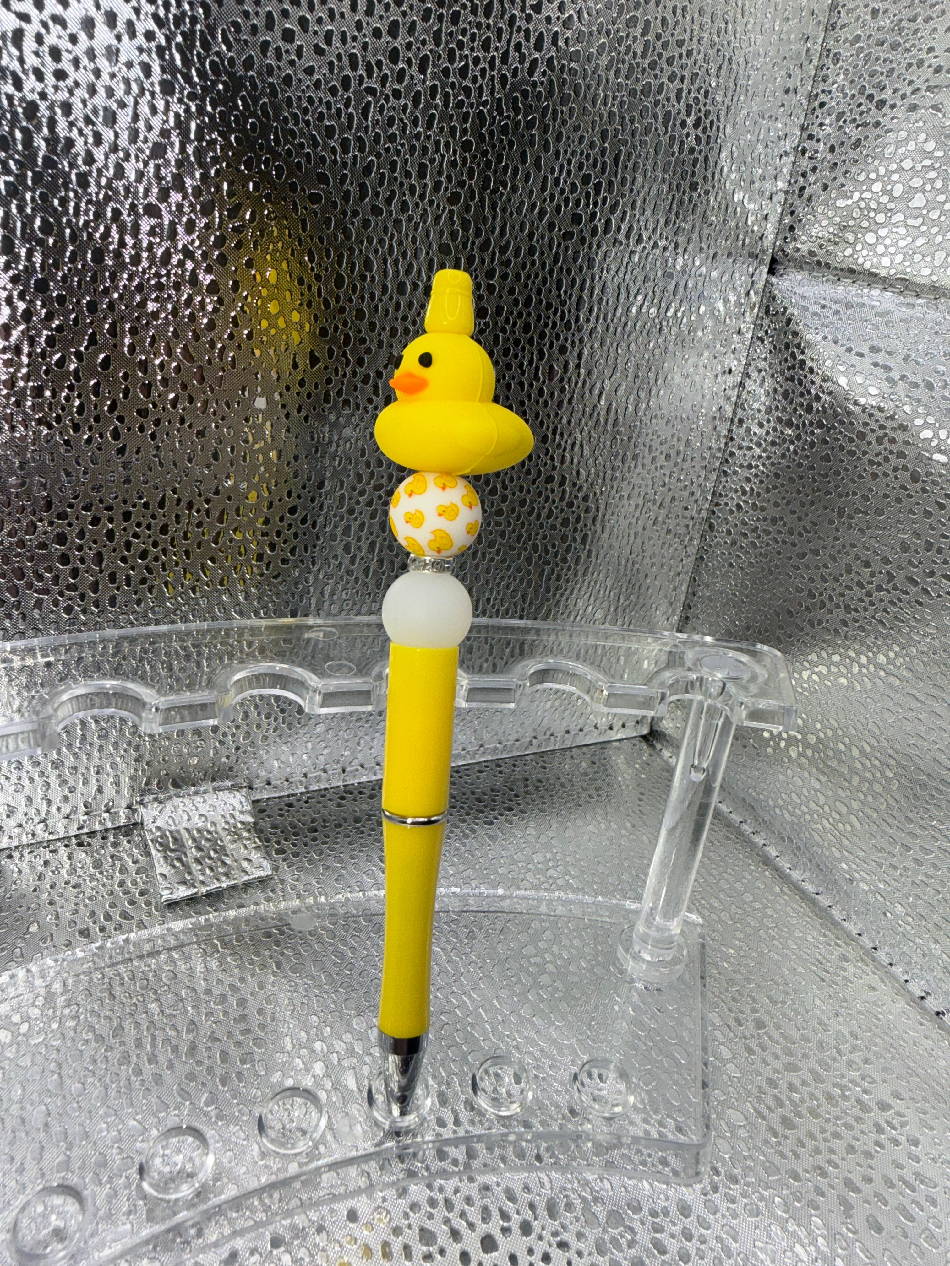 Yellow duck pen (black ink)
