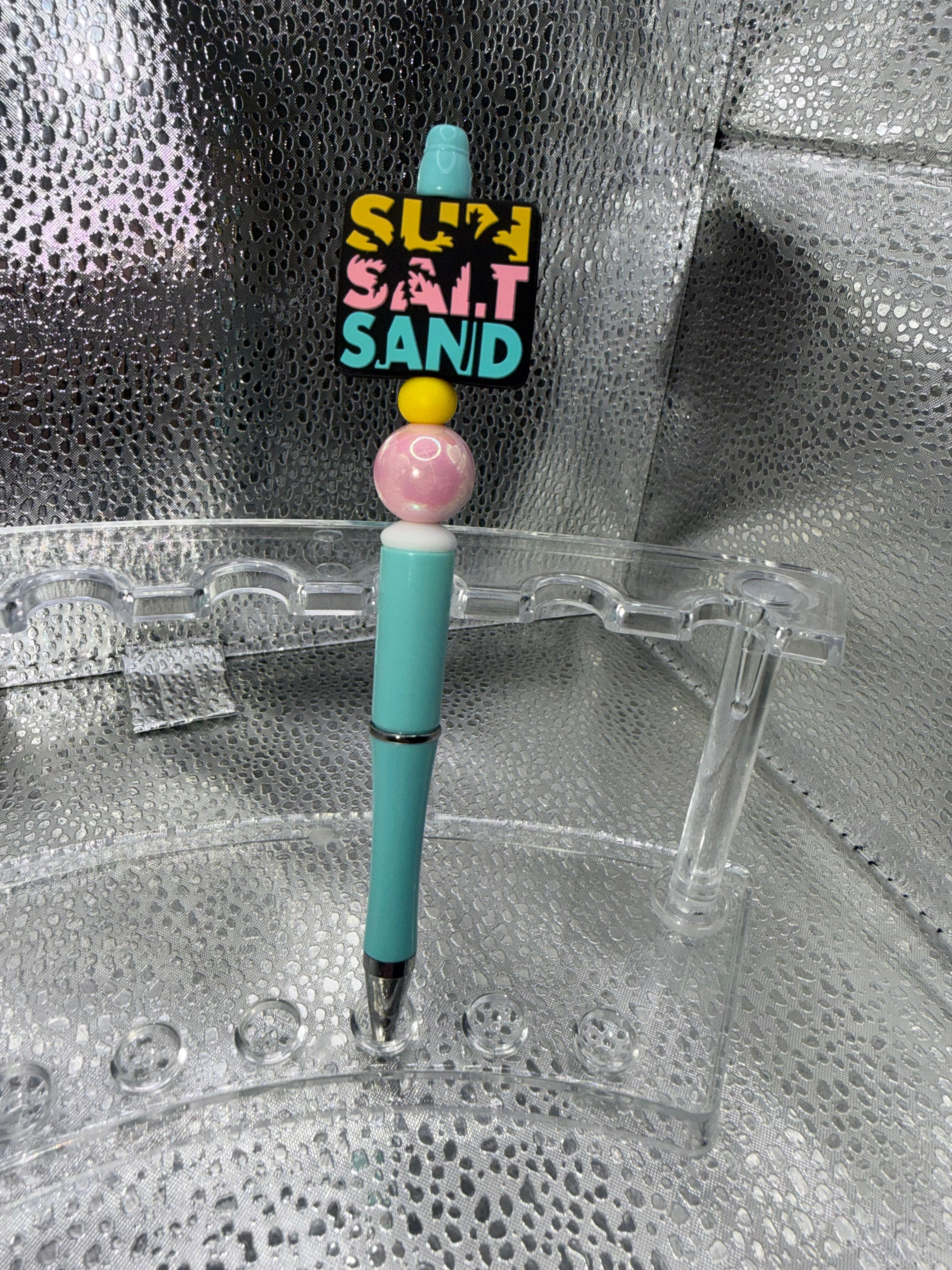 sun, salt, sand pen (black ink)
