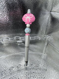 Pink seashell with pearl bow pen (black ink)