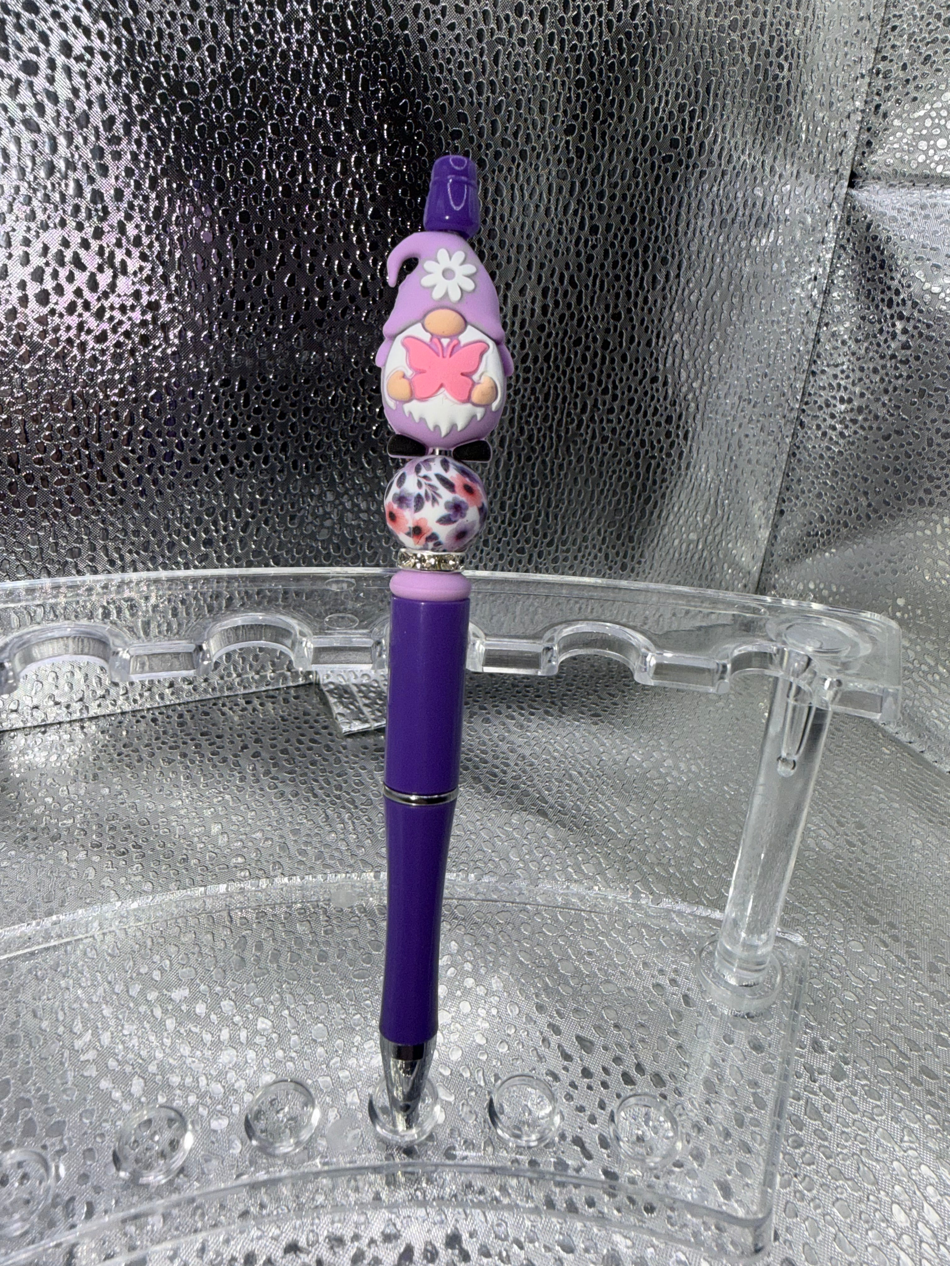 Purple gnome with pink butterfly pen (black ink)